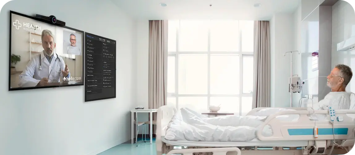 patient in bed with remote patient monitoring and a tv